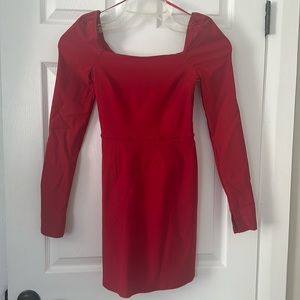 Size small red long sleeve mini dress. Never worn.